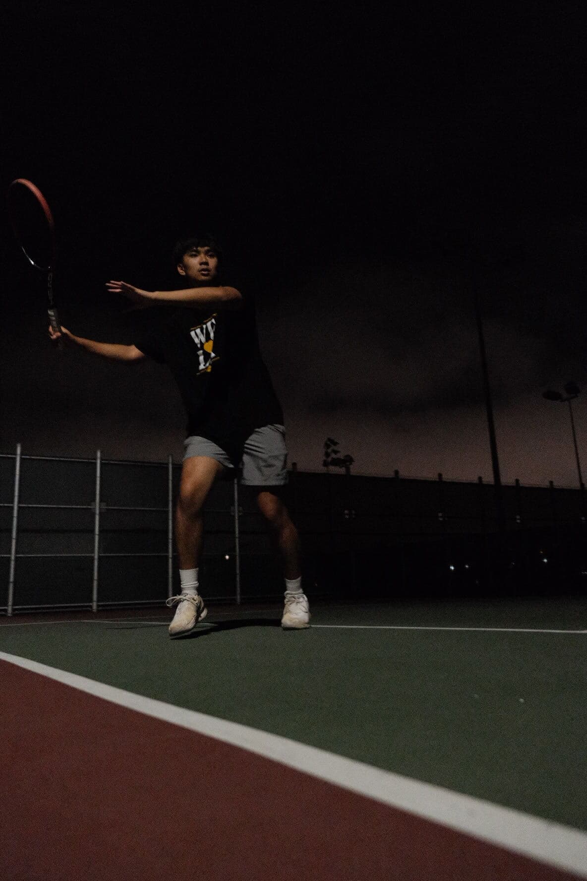 Playing tennis with a friend